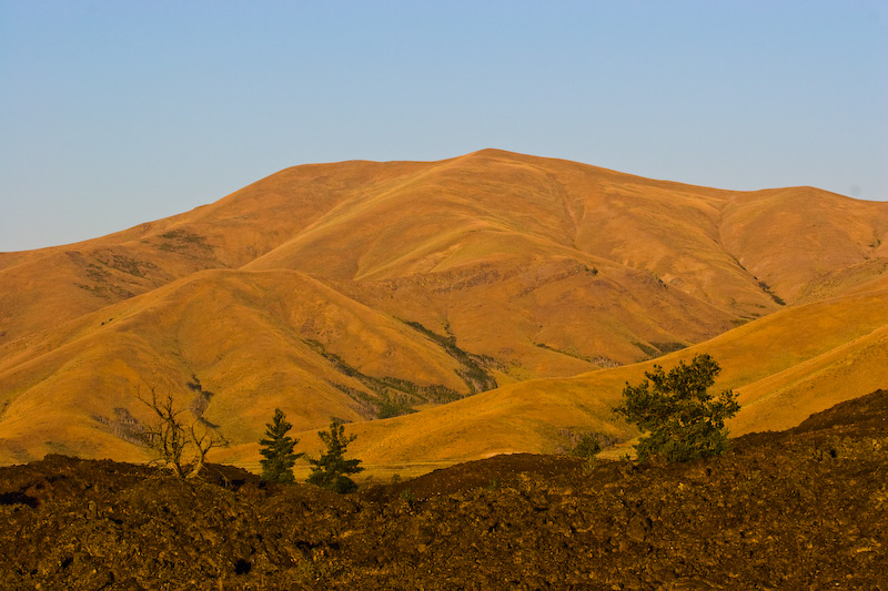 Grass Covered Hill Above Lava Flow